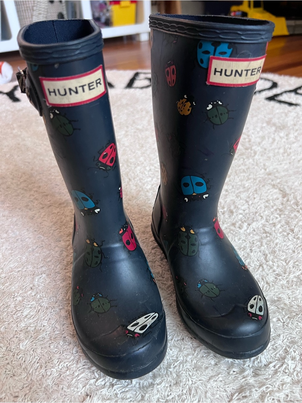 Hunter Kids Navy Rain Boots with Multicolor Ladybug Print - Picture 2 of 9